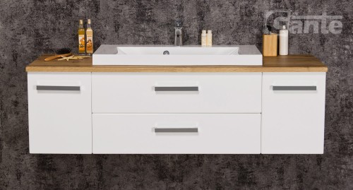 Wiszaca szafka łazienkowa z blatem w kolorze dębu szerokość 140 cm do tego umywalka nablatowa niska 2 szuflady po środku po bokach szafki głebokość 40 cm (3).jpg