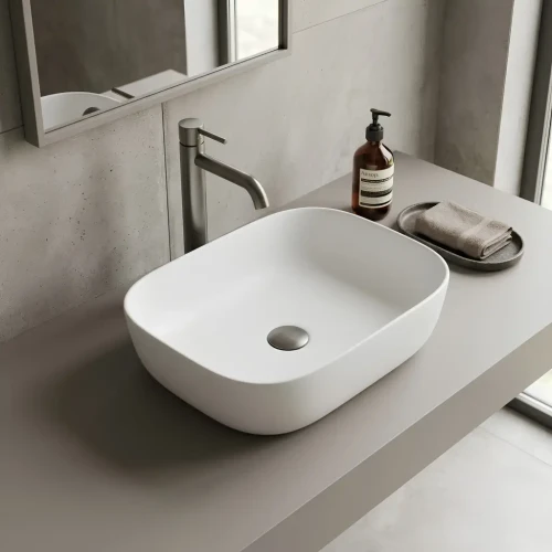 prostokatna-biala-umywalka-ceramiczna-nablatowa-zaokraglone-krawedzie-46-centymetrow-szerokosci-premium.webp