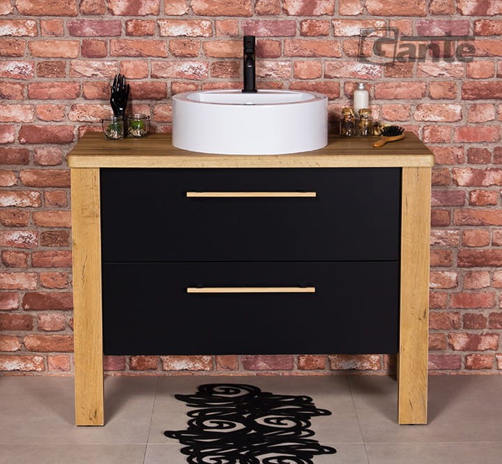 Stojaca szafka do łazienki z blatem biała umywalka nablatowa z miejscem do montażu baterii szerokość szafki 100 cm kolor czarny mat i drewno