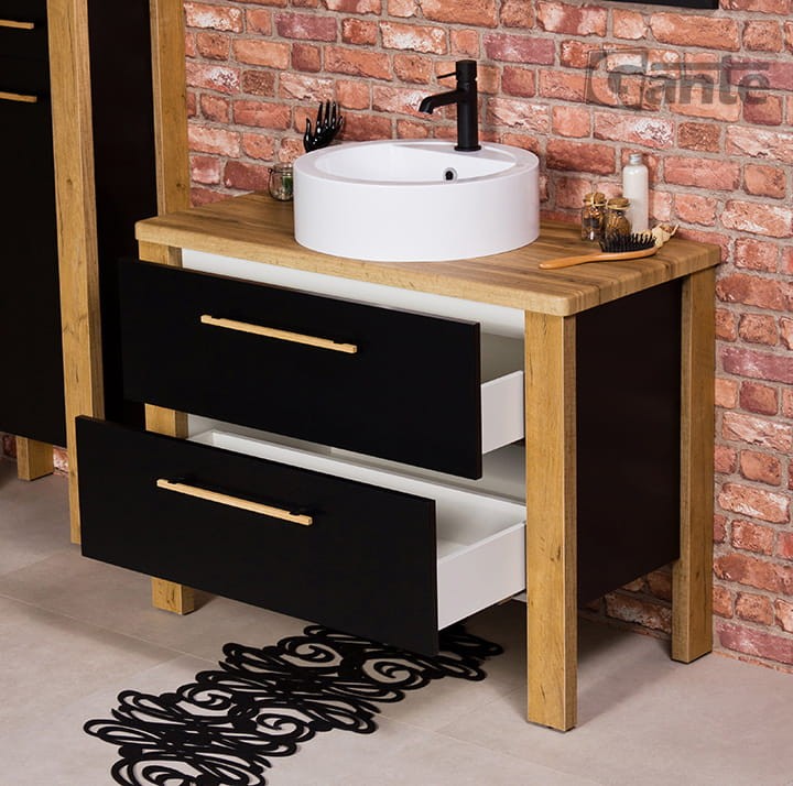 Stojaca szafka do łazienki z blatem biała umywalka nablatowa z miejscem do montażu baterii szerokość szafki 100 cm kolor czarny mat i drewno