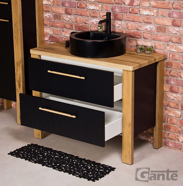 Stojaca szafka do łazienki z blatem czarna umywalka nablatowa z miejscem do montażu baterii szerokość szafki 100 cm kolor czarny mat i drewno