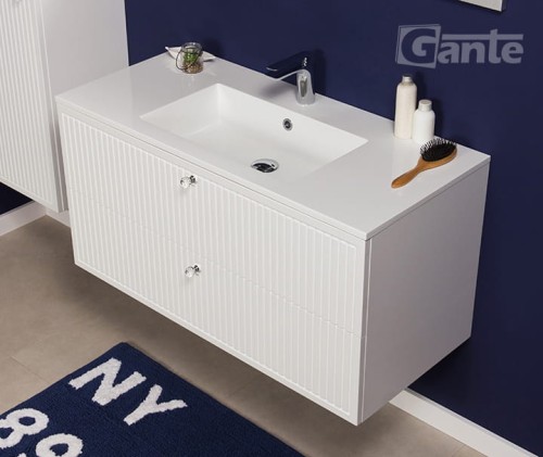 Biała szafka łazienkowa pod umywalkę 100 cm szerokości 2 szuflady ozdobne gałki kryształowe ryflowane fronty kolekcja Argento (1).jpg