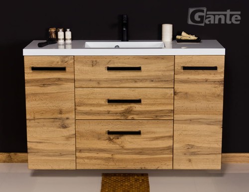 Fajna wisząca szafka pod umywalke 120 cm w dekorze dębu z czarnymi uchwytami  3 szuflady i 2 szafki cichy domyk w standardzie bardzo dobre opinie Klientów